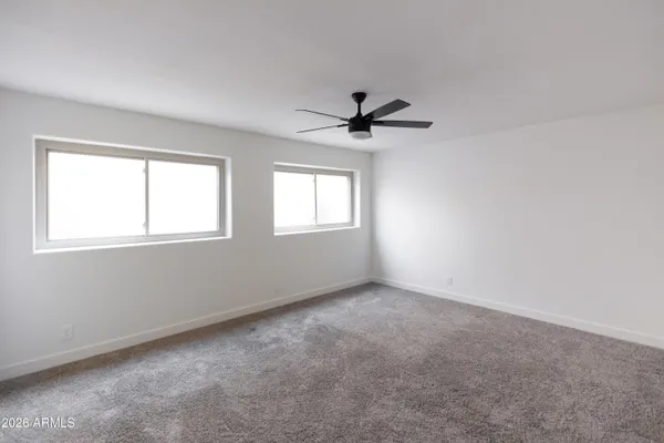 a bathroom with a toilet and a sink