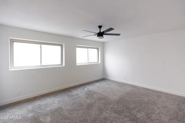 a bathroom with a toilet and a sink
