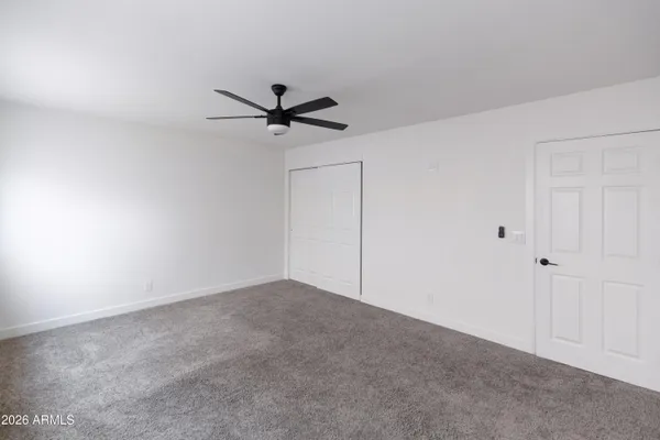 a view of balcony with wooden floor