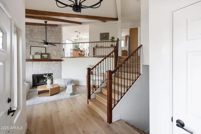 a view of a hallway with seating space and furniture