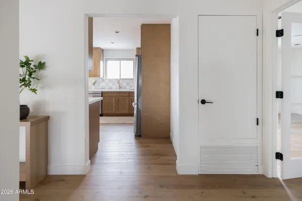 a kitchen with a sink cabinets and window