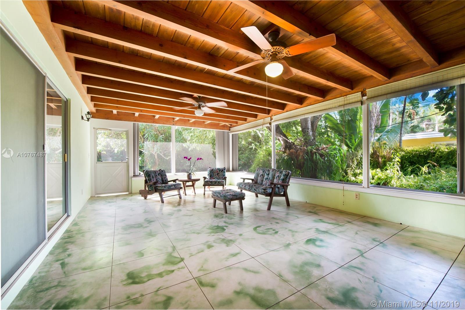 4010 Woodridge Road Miami, FL 33133 - Photo 11 of 12 Large Screened Patio