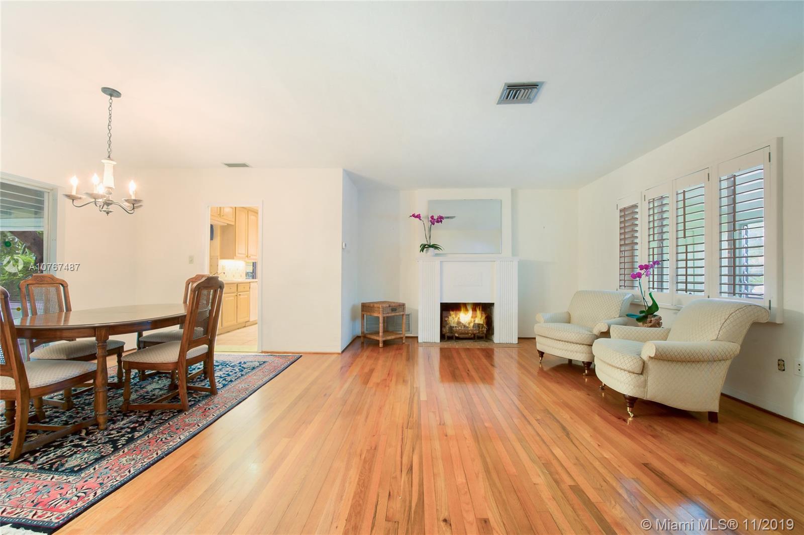 4010 Woodridge Road Miami, FL 33133 - Photo 3 of 12 Hardwood Floors Throughout
