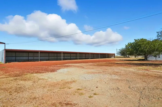 a view of an outdoor space and tennis court