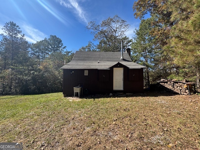 902 Pinyan Road Southeast Ranger, GA 30734 - Photo 7 of 60 a front view of a house with a yard
