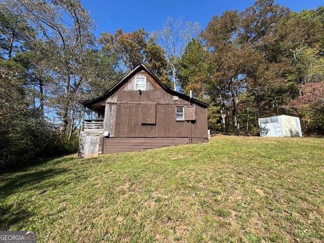 902 Pinyan Road Southeast Ranger, GA 30734 - Photo 10 of 60 a view of a back yard of the house