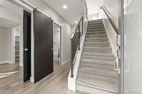 a workspace with furniture and bathroom