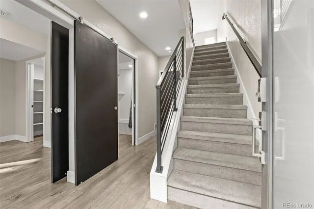 a workspace with furniture and bathroom