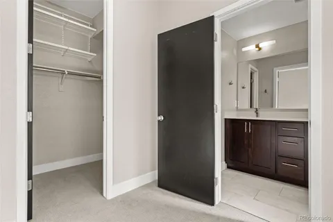 a bathroom with a toilet a sink and bathtub