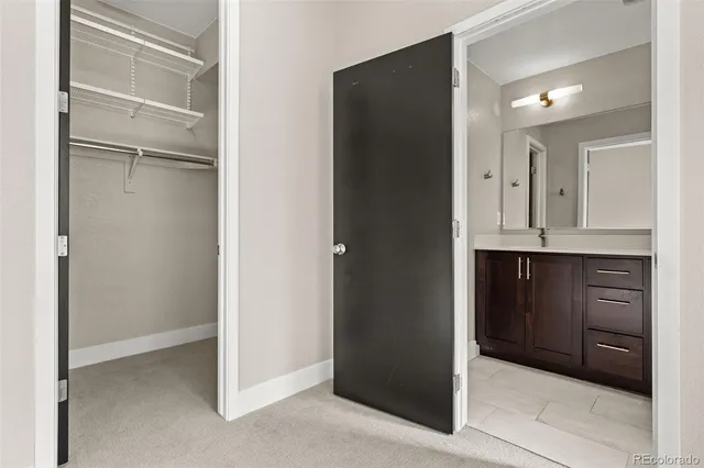 a bathroom with a toilet a sink and bathtub