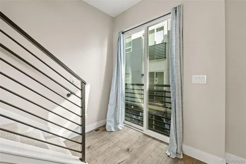 a view of a lake with a house in the background