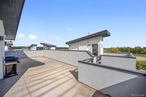 a view of a hallway with washer and dryer
