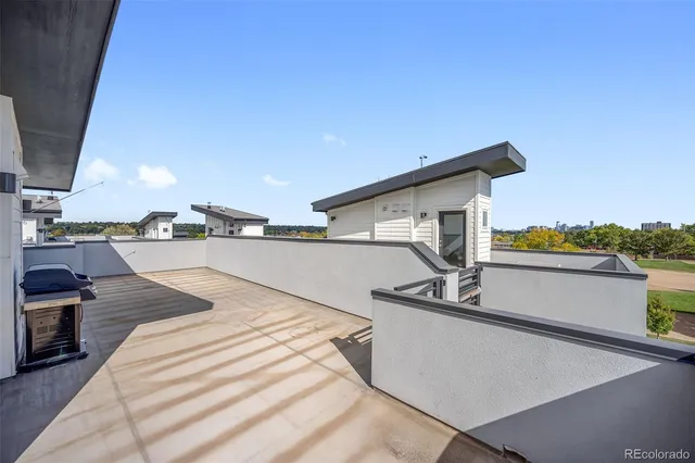 a view of a hallway with washer and dryer