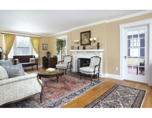 166 Ridge Avenue Newton, MA 02459 - Photo 4 of 9 a living room with furniture and a fireplace
