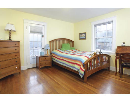 166 Ridge Avenue Newton, MA 02459 - Photo 5 of 9 a bedroom with a bed and a dresser