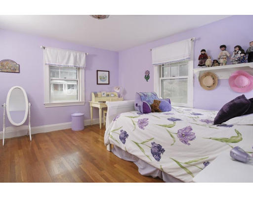 166 Ridge Avenue Newton, MA 02459 - Photo 6 of 9 a bed room with a bed and a table