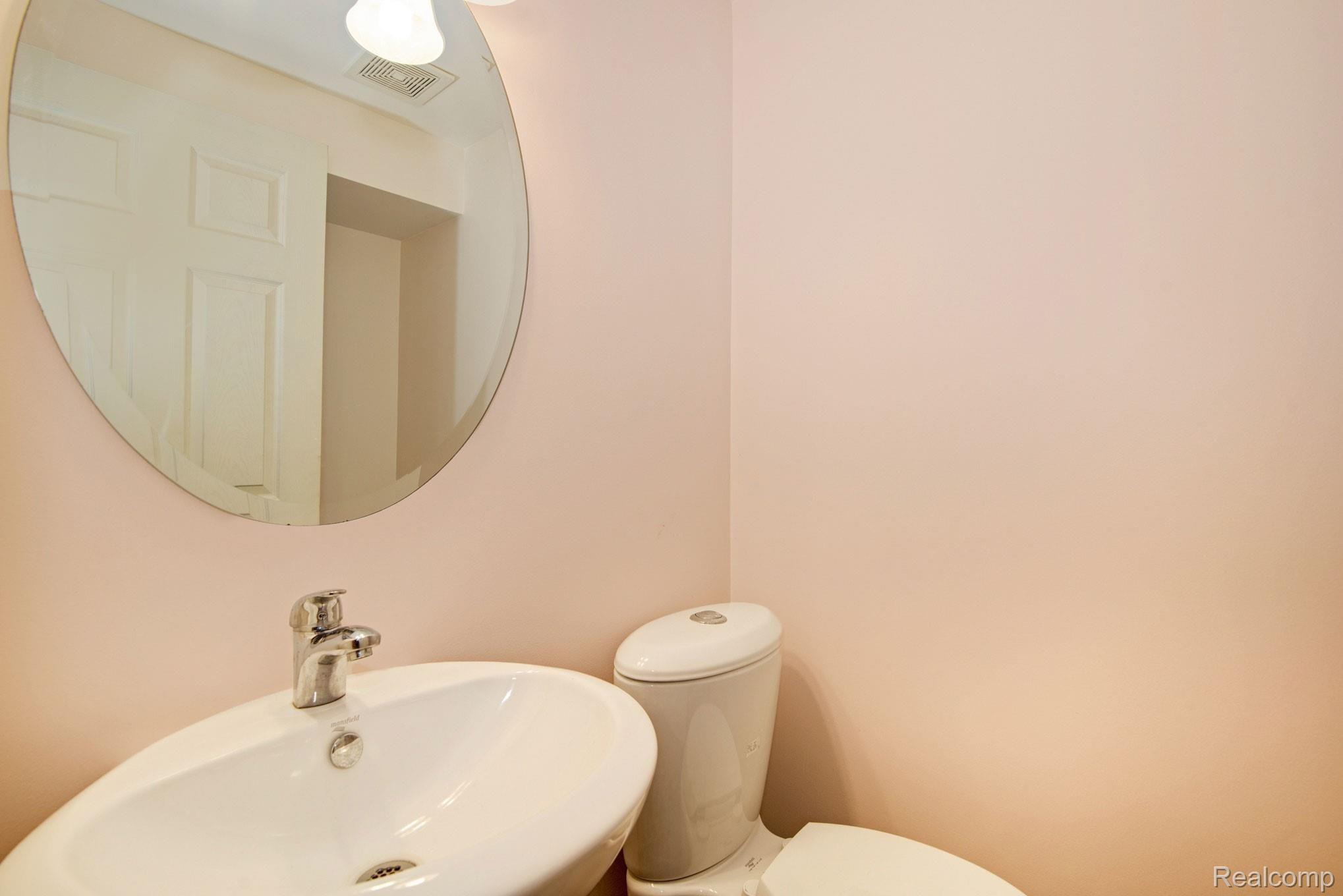 1231 Crooked Lake Road Fenton, MI 48430 - Photo 36 of 48 Half bath in lower level.jpg