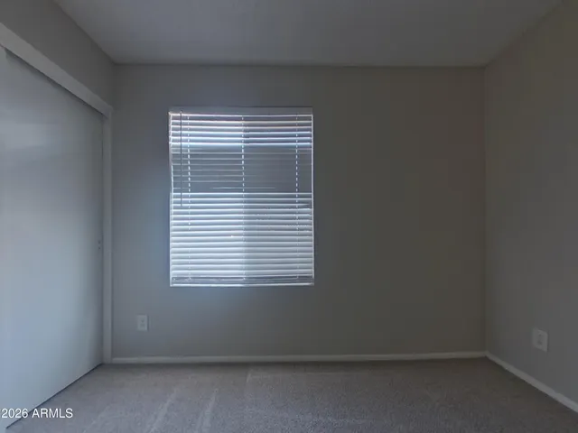a bathroom with a sink toilet a mirror and shower