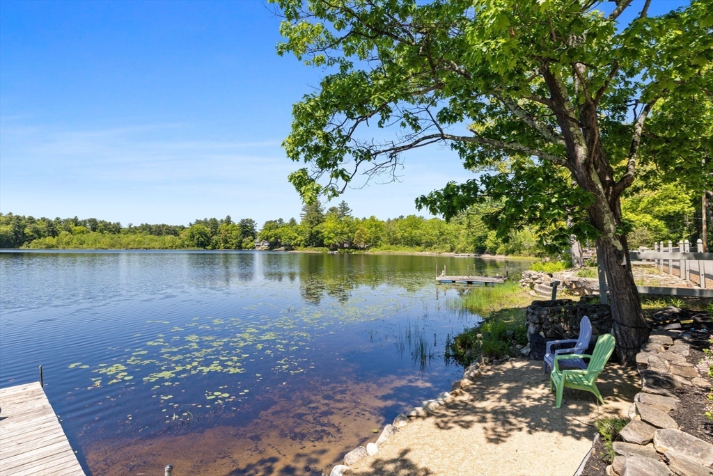 35 Keyes Road Westford, MA 01886 - Photo 31 of 40 a view of a lake with houses in the back