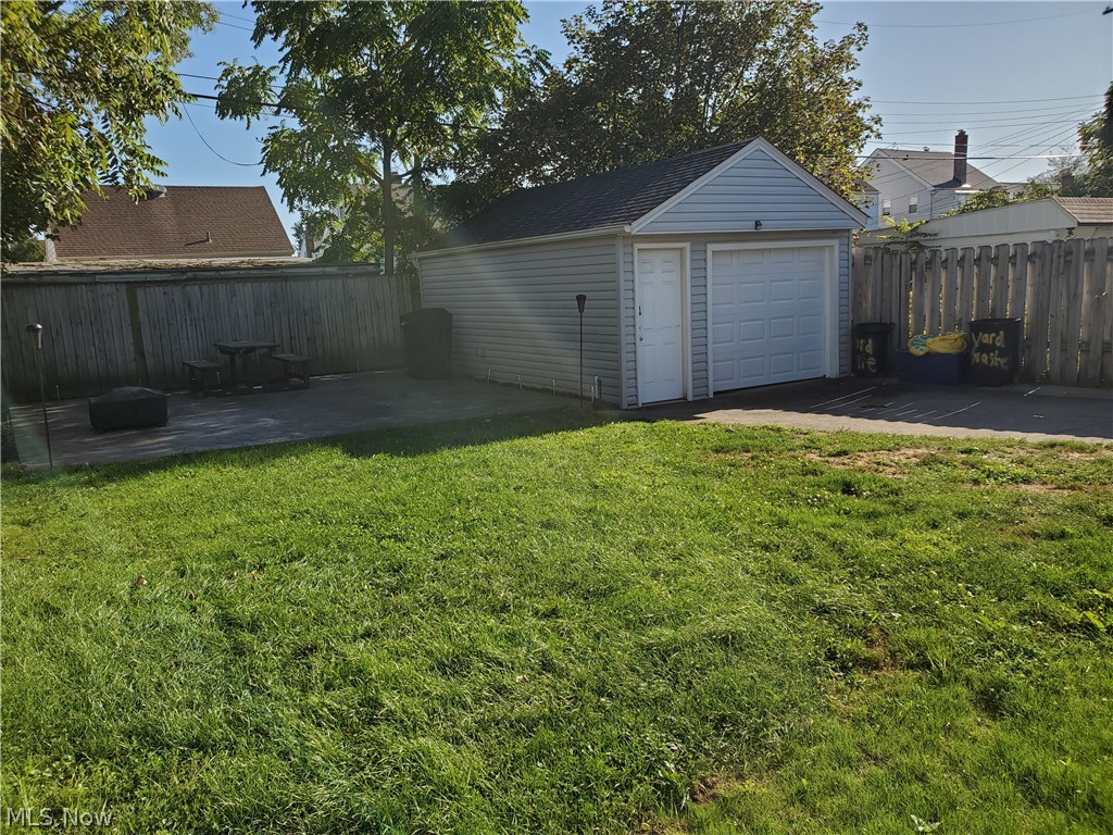 5615 Ridgewood Avenue Parma, OH 44129 - Photo 2 of 19 Full privacy wood fence except across drive, newer garage sing and garage door