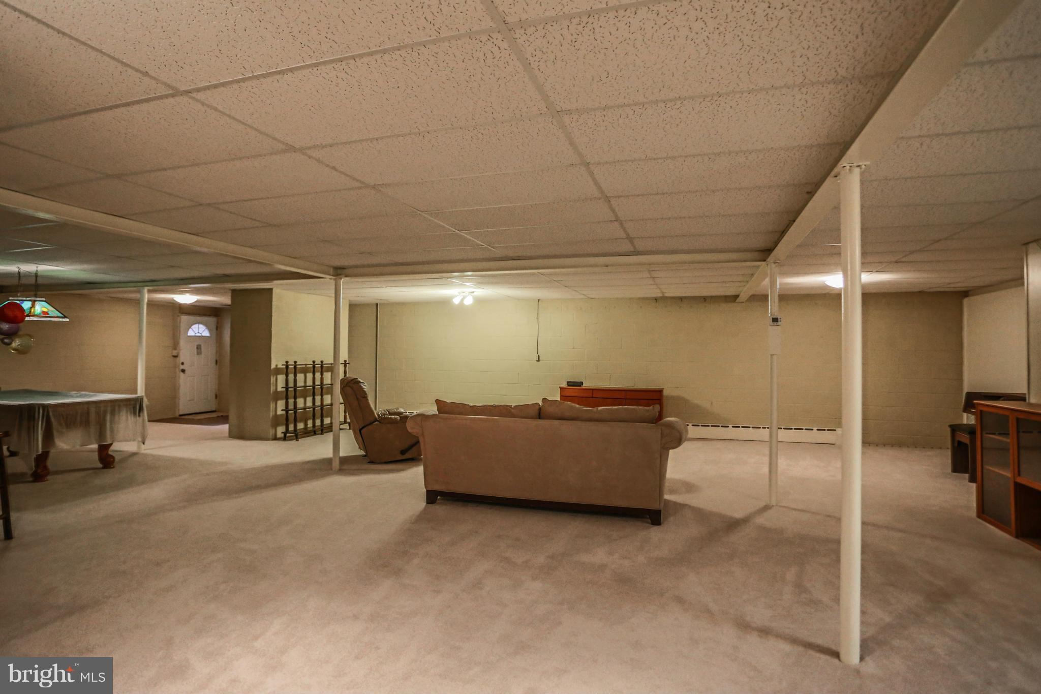 15312 Merrifields Court Silver Spring, MD 20906 - Photo 24 of 30 Recreation room with exit to side yard