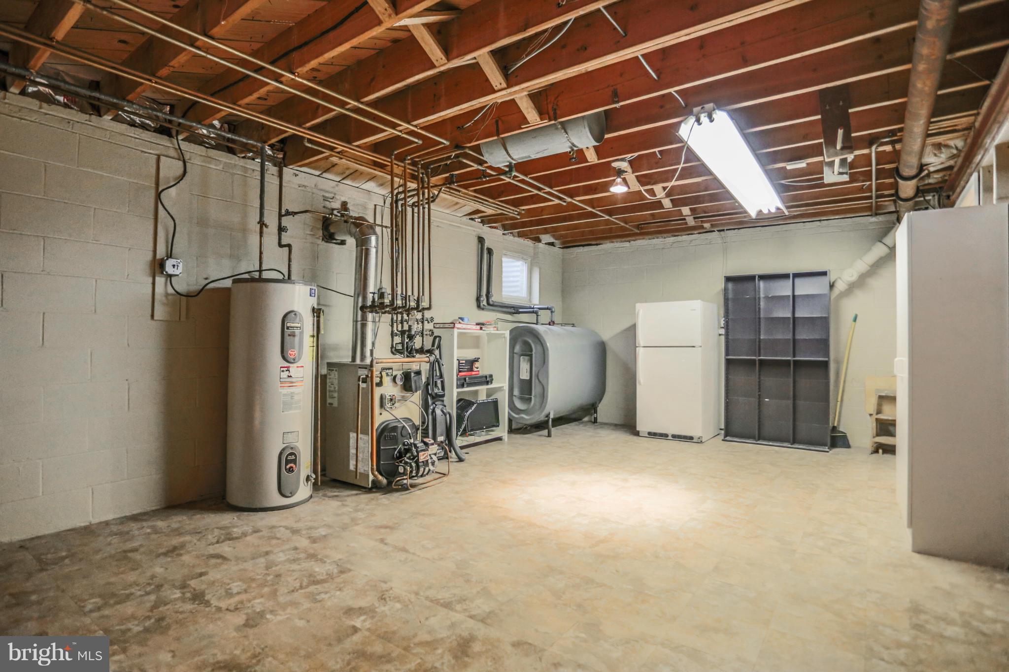 15312 Merrifields Court Silver Spring, MD 20906 - Photo 25 of 30 Utility room with new oil tank