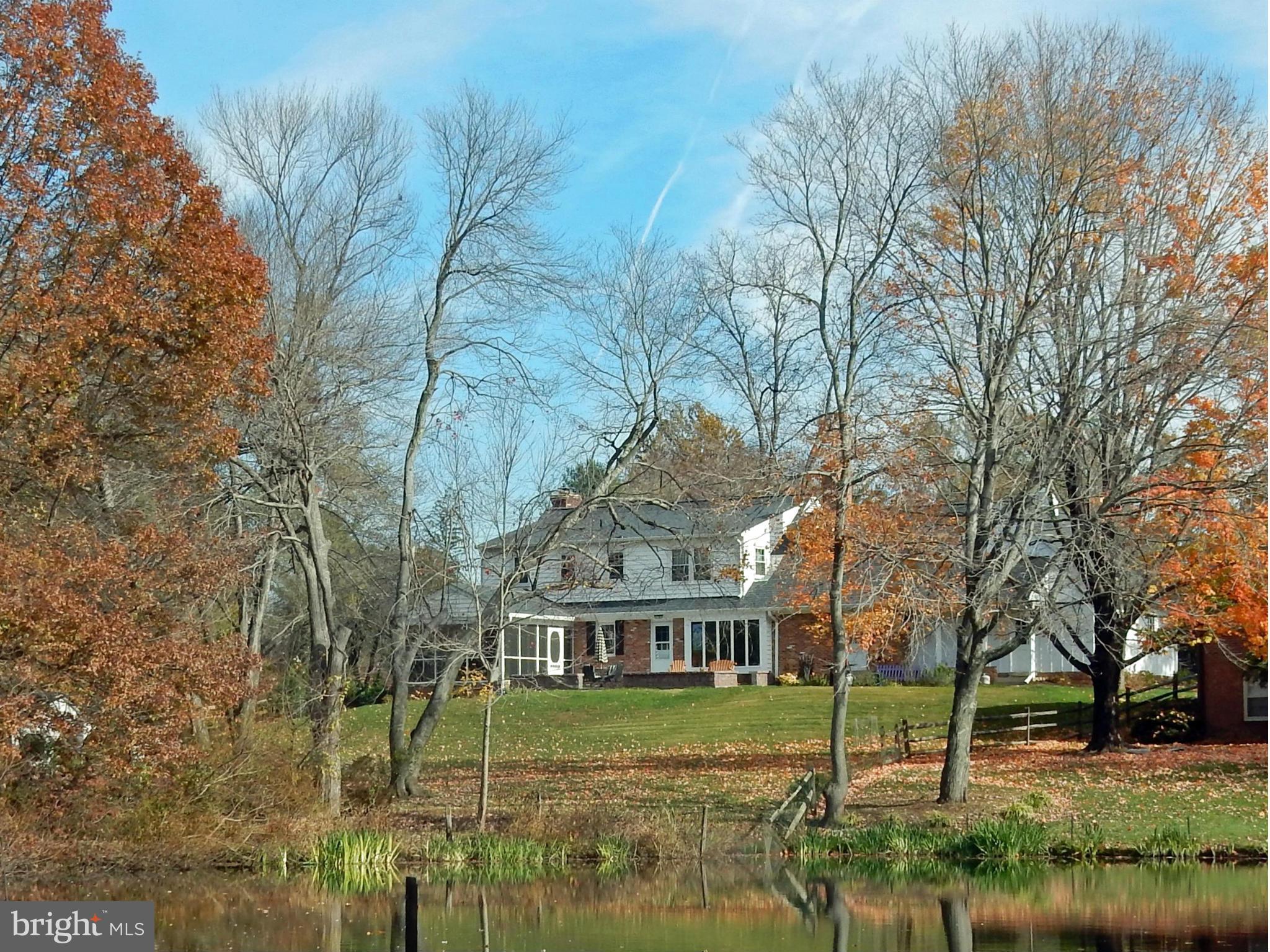 15312 Merrifields Court Silver Spring, MD 20906 - Photo 26 of 30 View of the house from the pond - autumn