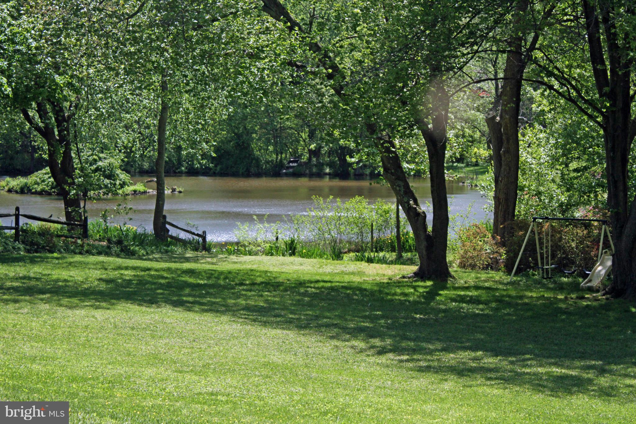 15312 Merrifields Court Silver Spring, MD 20906 - Photo 28 of 30 View of the pond in the summer