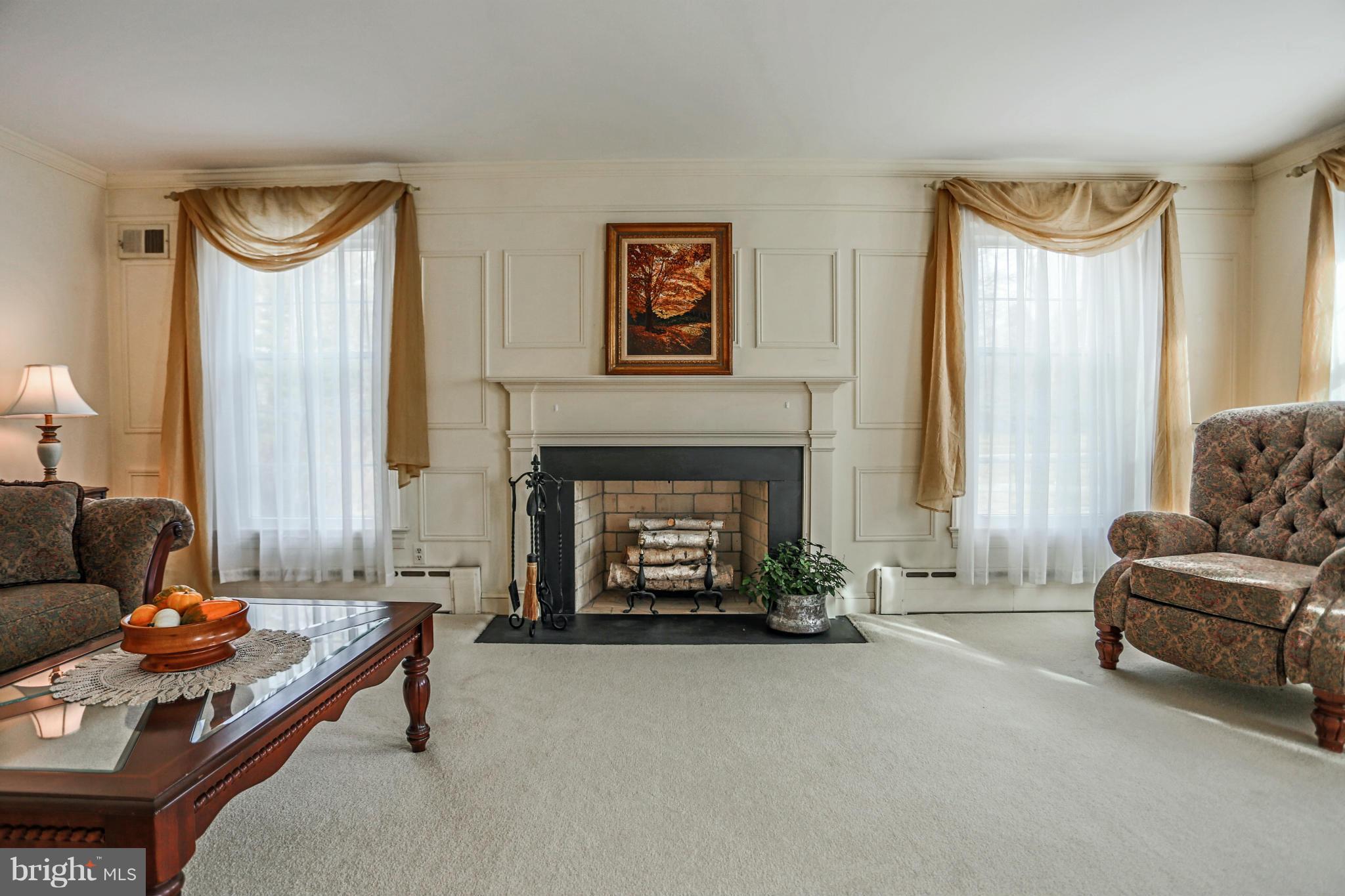 15312 Merrifields Court Silver Spring, MD 20906 - Photo 5 of 30 Elegant living room with wood-burning fireplace