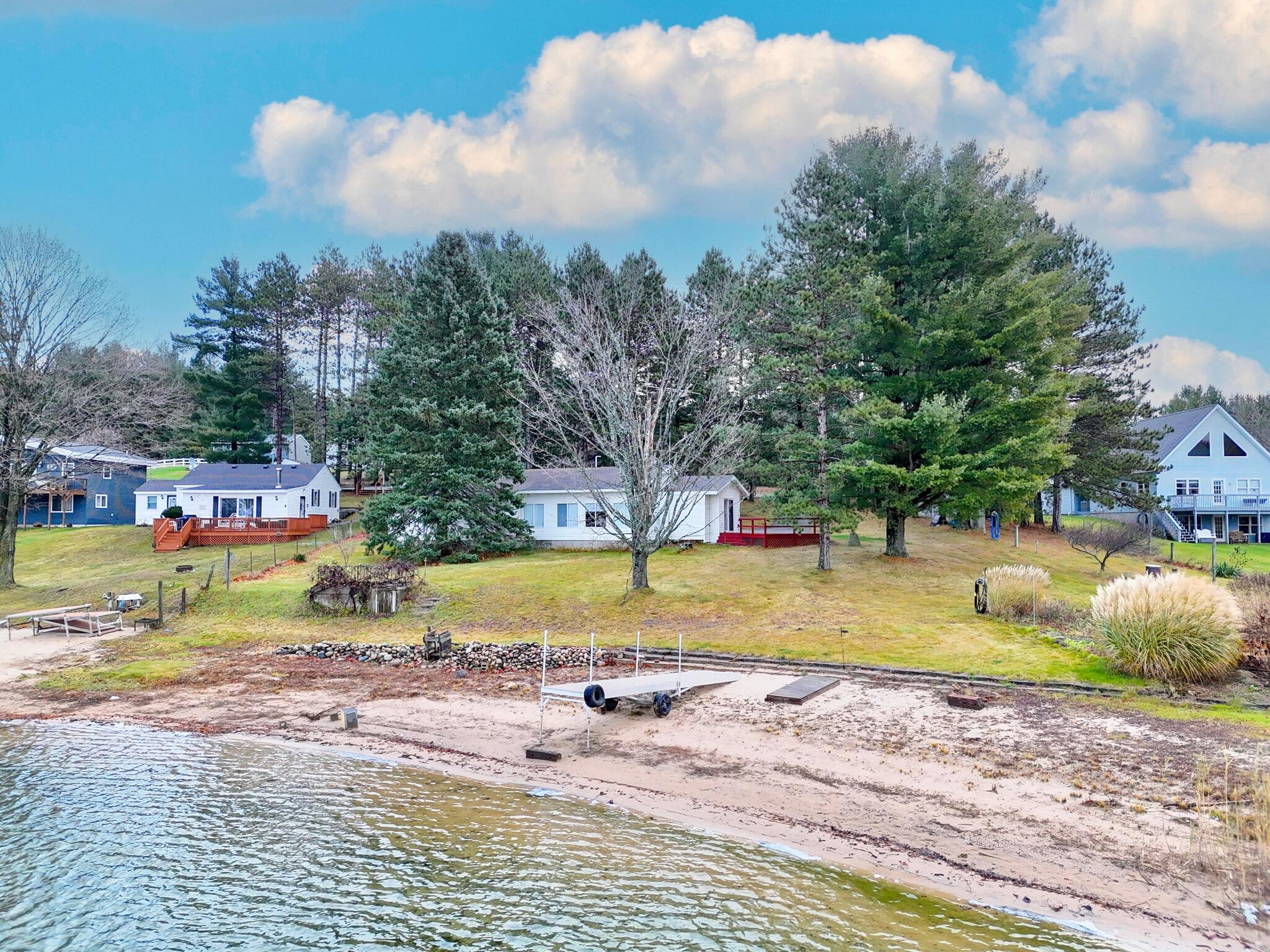 347 27 1/4 Road Cadillac, MI 49601 - Photo 4 of 57 DJI_20231116214619_0089_D copy