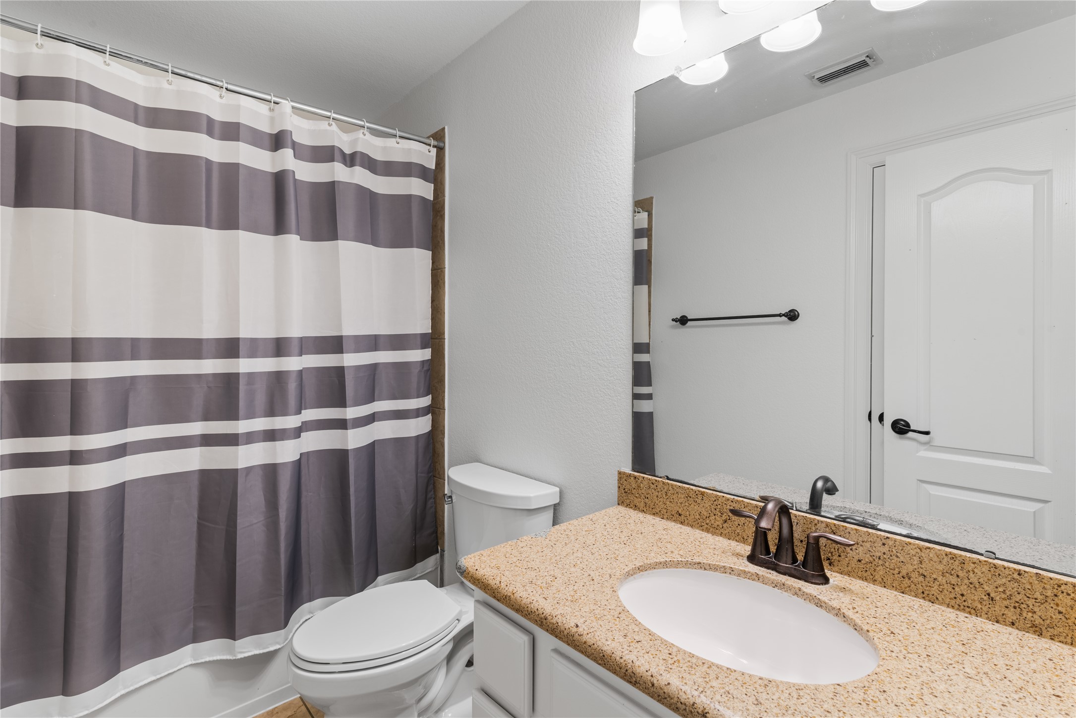 155 South Arrow Canyon Circle Spring, TX 77389 - Photo 28 of 49 Between two of the upstairs bedrooms, one of the secondary bathrooms continues the home's sophisticated and cohesive design with granite countertops and under the sink storage.