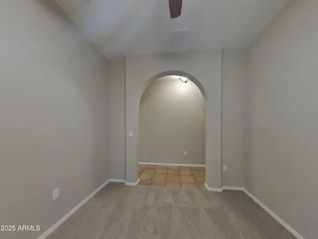 a bathroom with a sink toilet vanity and shower