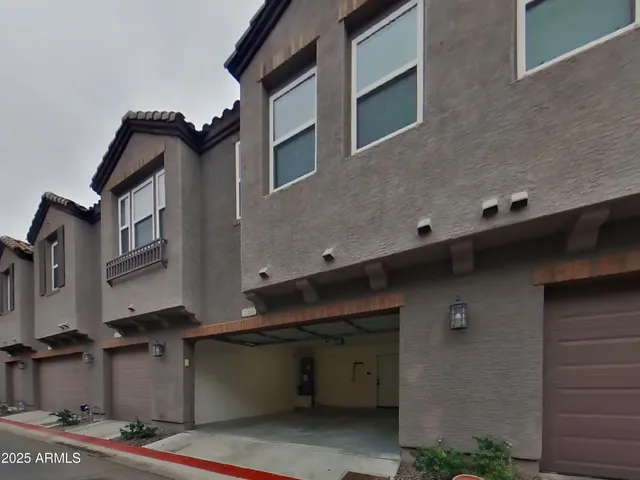 a view of room with a ceiling fan and window