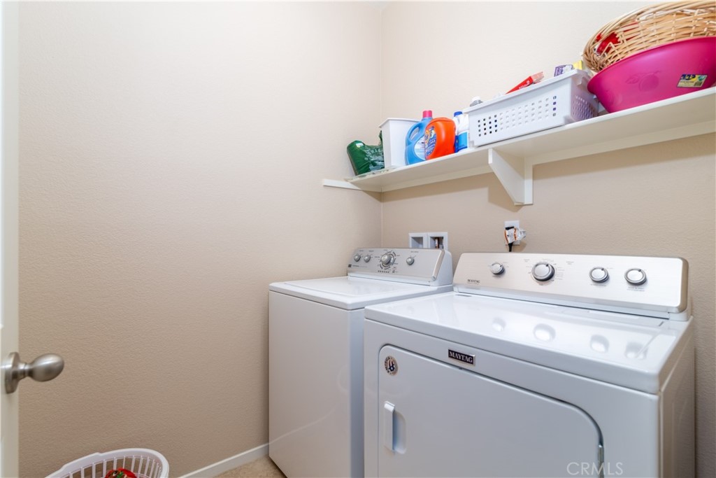 27336 Brandon Lane Temecula, CA 92591 - Photo 19 of 49 a utility room with dryer and washer