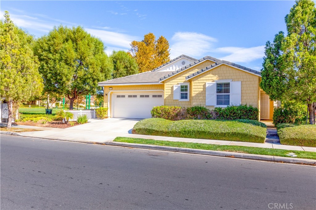 27336 Brandon Lane Temecula, CA 92591 - Photo 3 of 49 a front view of a house with a yard and garage