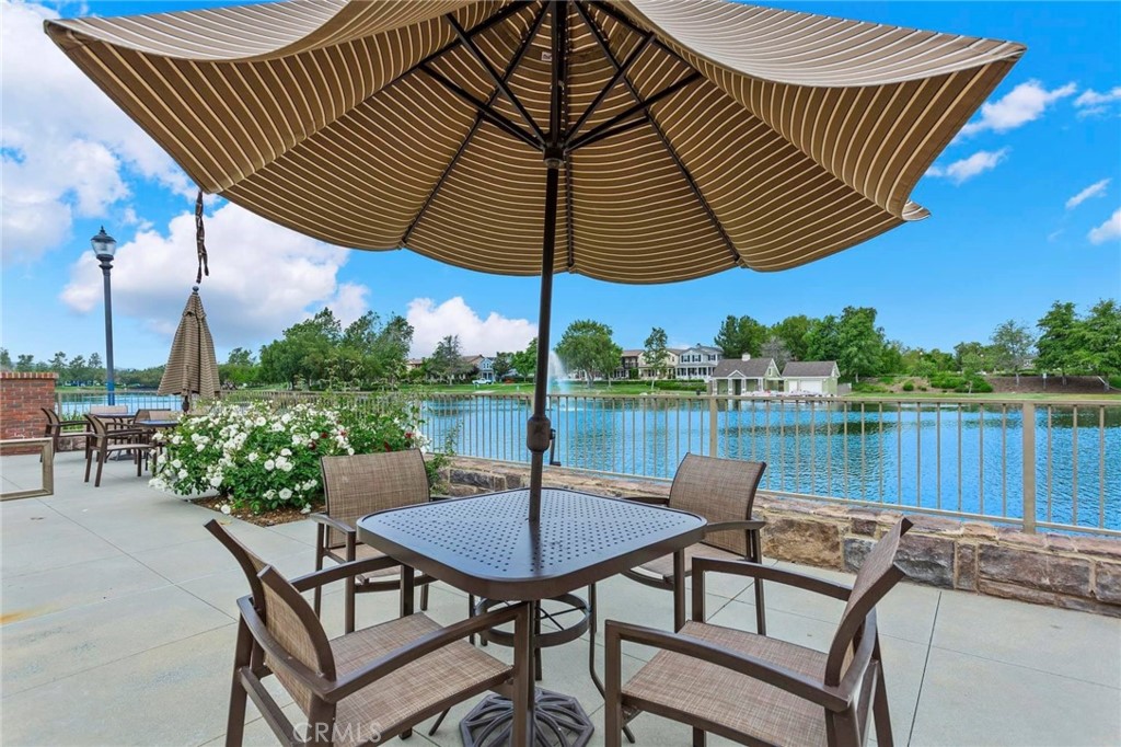 27336 Brandon Lane Temecula, CA 92591 - Photo 42 of 49 a view of a patio with a table chairs and a wooden deck