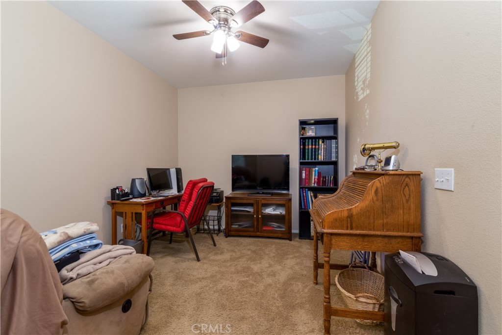 27336 Brandon Lane Temecula, CA 92591 - Photo 5 of 49 a living room with furniture and a flat screen tv