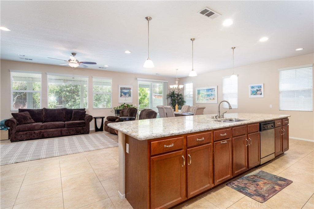 27336 Brandon Lane Temecula, CA 92591 - Photo 10 of 49 a bathroom with a granite countertop sink and a large mirror