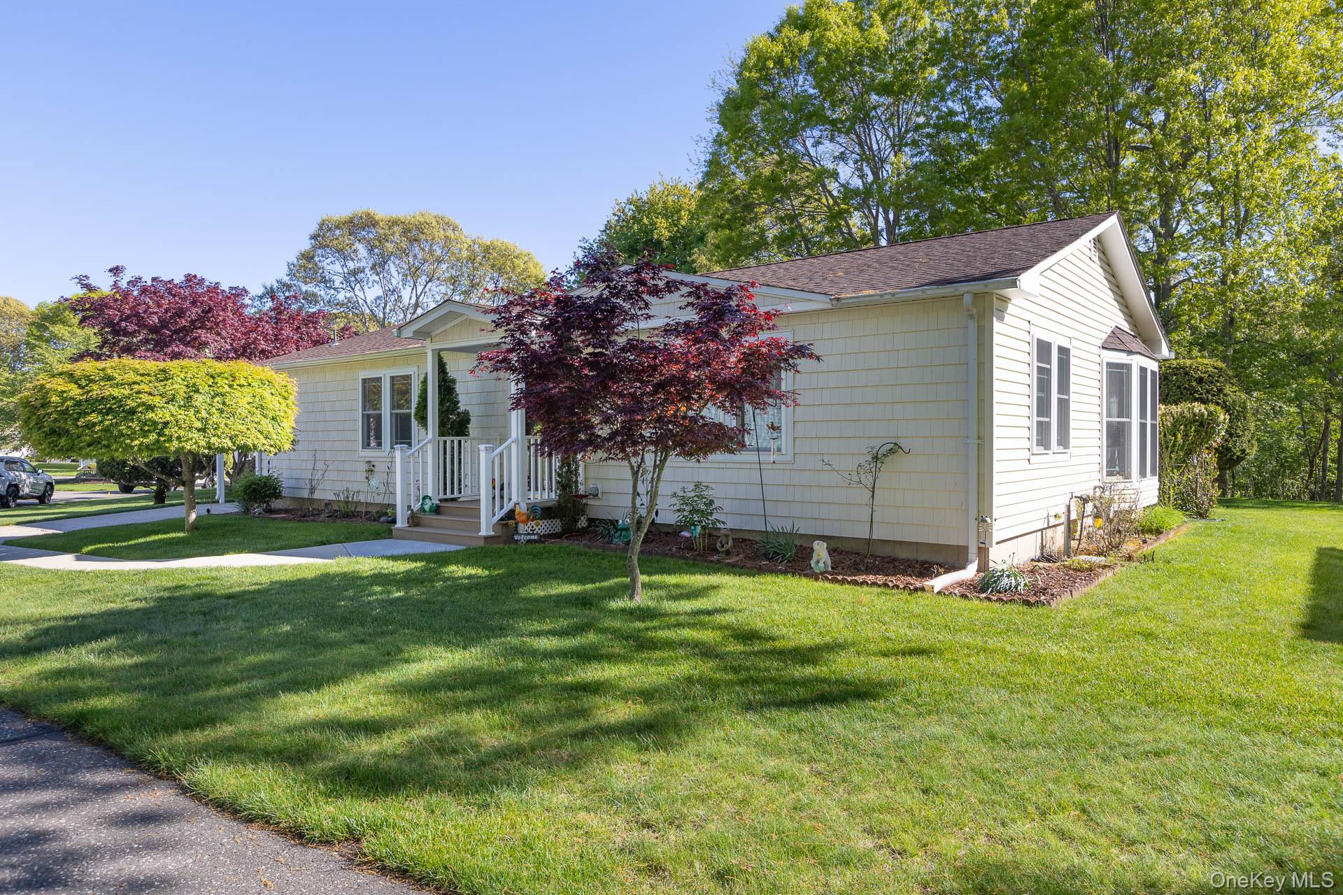 1407 Middle Road, Unit 83 Calverton, NY 11933 - Photo 3 of 37