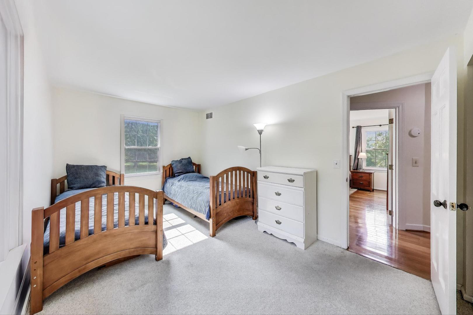 25839 West Sunset Road Barrington, IL 60010 - Photo 26 of 54 a bedroom with furniture and a window