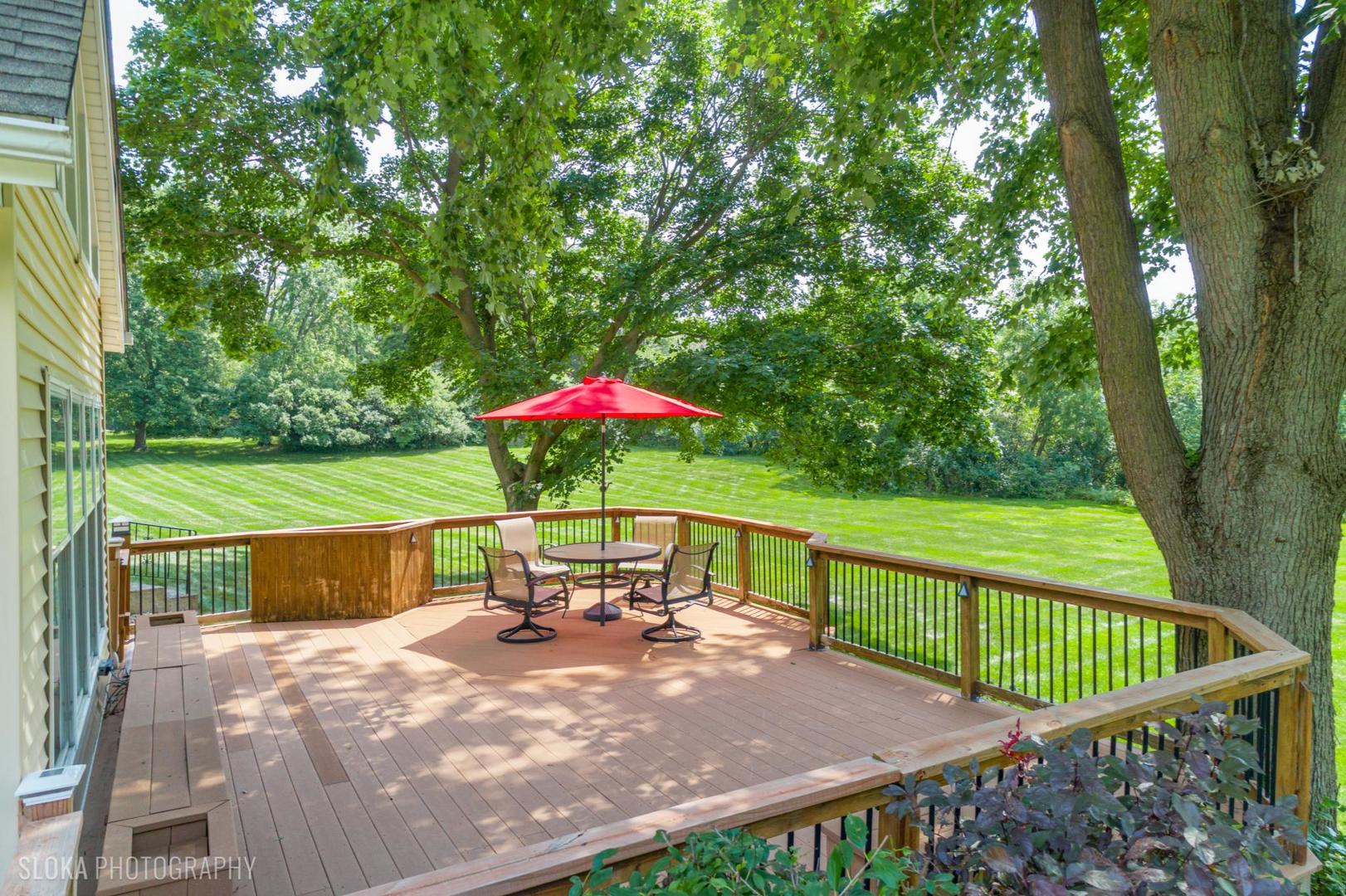 25839 West Sunset Road Barrington, IL 60010 - Photo 36 of 54 a view of a bench in the backyard