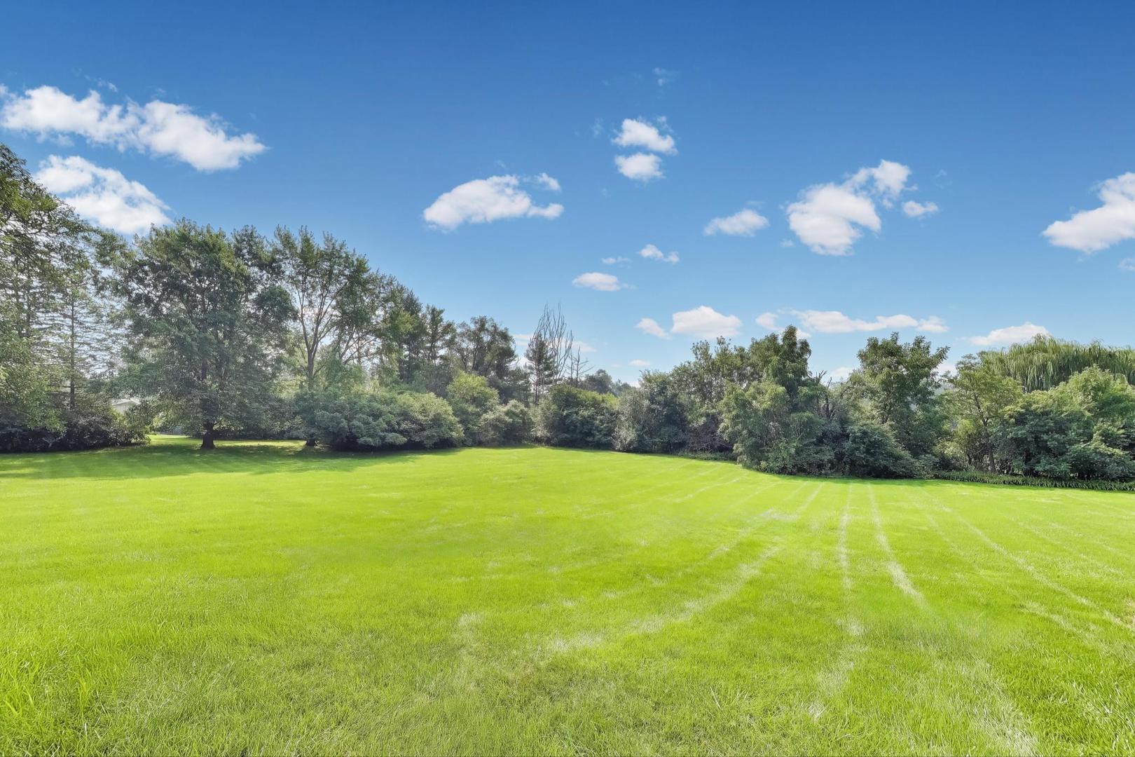 25839 West Sunset Road Barrington, IL 60010 - Photo 43 of 54 a view of an ocean and in a yard