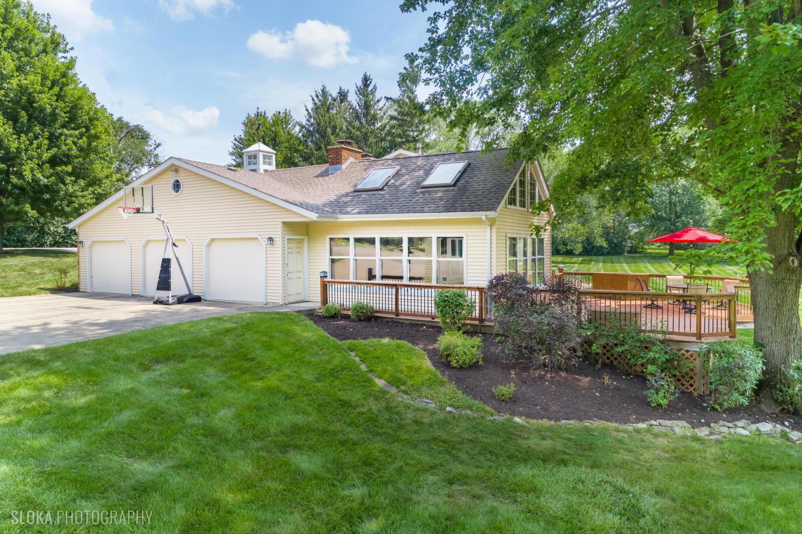 25839 West Sunset Road Barrington, IL 60010 - Photo 45 of 54 a view of a house with a yard