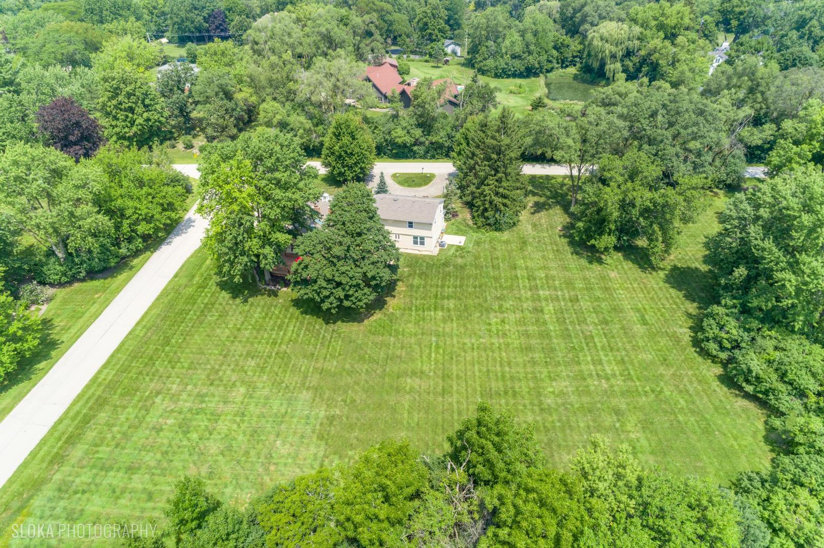 25839 West Sunset Road Barrington, IL 60010 - Photo 49 of 54 a view of a back yard