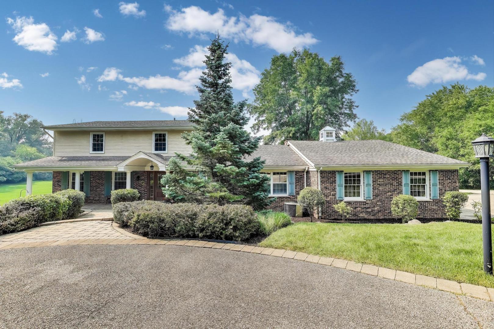 25839 West Sunset Road Barrington, IL 60010 - Photo 6 of 54 a front view of house with yard and green space