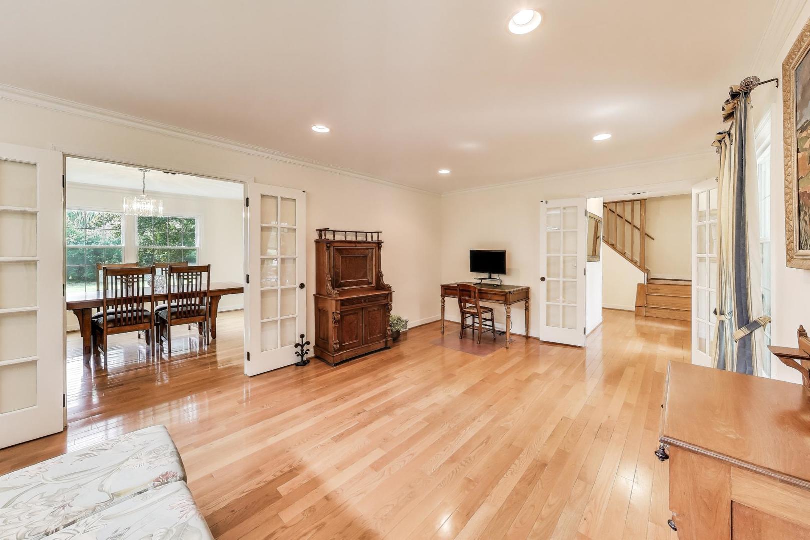25839 West Sunset Road Barrington, IL 60010 - Photo 9 of 54 a room with furniture and a wooden floor