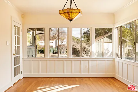 a view of a porch with a backyard
