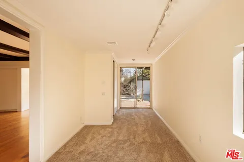 a view of a bedroom with closet