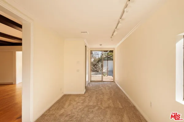 a view of a bedroom with closet