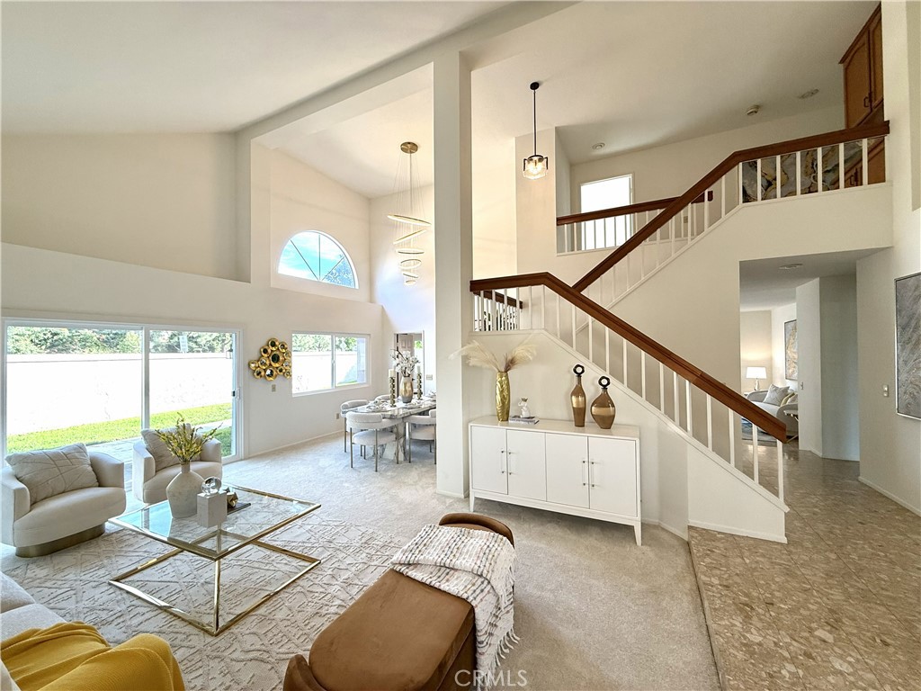 18 Decente Irvine, CA 92614 - Photo 1 of 1 a living room with furniture cabinets and wooden floor